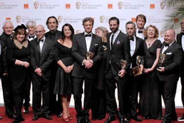epa British actor Colin Firth (C) posing with crew of The King's Speech film and presenter US actor Samuel L. Jackson (R) during the 2011 Orange British Academy Film Awards (BAFTA) held at the Royal Opera House in central London, Britain, on 13 February 2011.