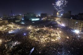 epa02576902 A general view shows firework explode over Tahrir square as Egyptian anti government protesters react minutes after the announcement of the resignation of President Hosni Mubarak from his post, in Cairo, Egypt, 11 February 2011. It was announced by vice president Omar Suleiman 11 February that Egyptian President Hosny Mubarak had resigned. Egyptian President Hosni Mubarak, 82, ruled Egypt for nearly 30 years. EPA