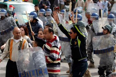 Riot policemen disperse protesters during a demonstration calling for the improvement of infrastructure and basic services such as electricity and water, in central Baghdad March 11, 2011. The demonstrators also called for the government to take real measures to fight corruption.
