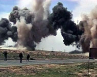 قصف مدفعية الكتائب أوقع ثمانية قتلى في صفوف الثوار (الجزيرة)