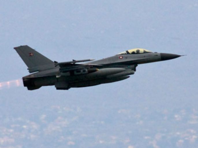A Danish F-16 Fighting Falcon ascends after taking off from Sigonella NATO Airbase in the southern Italian island of Sicily March 20, 2011. Danish Defence Minister Gitte Lillelund Bech said that six Danish fighter planes had been deployed to Sicily. Four were awaiting U.S. instructions to join operations over Libya on Sunday, and two would be kept in reserve.