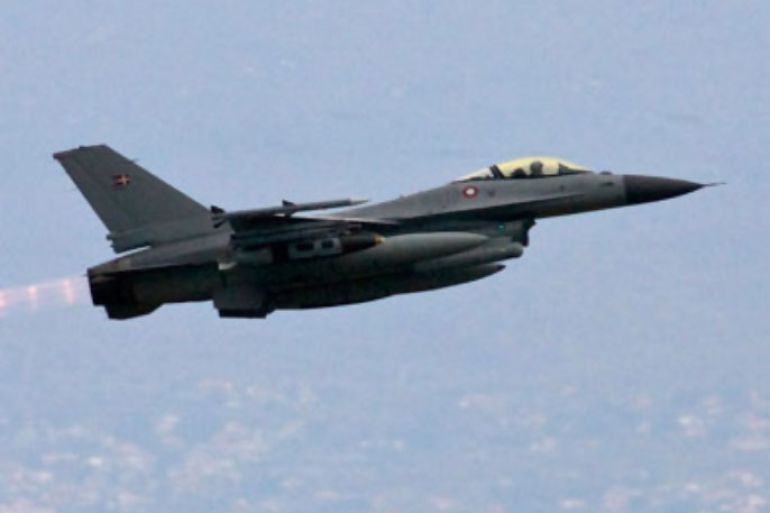 A Danish F-16 Fighting Falcon ascends after taking off from Sigonella NATO Airbase in the southern Italian island of Sicily March 20, 2011. Danish Defence Minister Gitte Lillelund Bech said that six Danish fighter planes had been deployed to Sicily. Four were awaiting U.S. instructions to join operations over Libya on Sunday, and two would be kept in reserve.