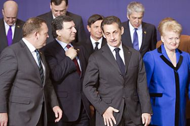 L-R) Danish Prime Minister Lars Loekke Rasmussen, European Commission President Jose Manuel Barroso, French President Nicolas Sarkozy and Lithuanian President Dalia Grybauskaite leave after a family photo of an EU summit