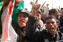 Community police protest and shout slogans during a demonstration in Algiers March 7, 2011. The government has said it will disband their force and officers want the government to meet their demands for pensions.