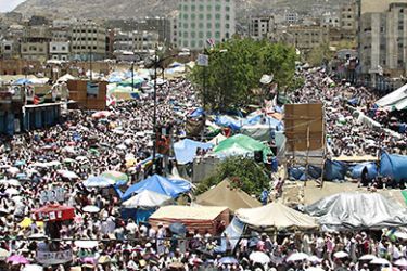 A general view shows a rally by anti-government protesters demanding the ouster of Yemen's President Ali Abdullah Saleh in the southern city of Taiz April 29, 2011. Vast crowds took to the streets across Yemen on Friday to demand the immediate ouster of Saleh, instead of the phased handover of power envisaged by a