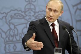 r_Russian Prime Minister Vladimir Putin answers a question at a news conference in Copenhagen April 26, 2011. Putin sharply criticised the Western coalition enforcing a no-fly