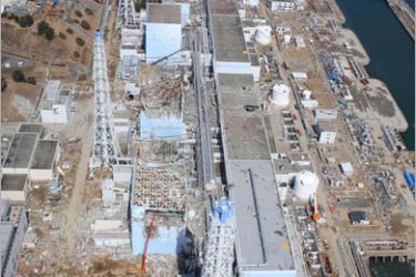 R: An aerial view of the Fukushima Daiichi Nuclear Power Station is seen in Fukushima Prefecture in this file photo taken by Air Photo Service on March 24, 2011. Japan will pump radioactive water into the sea from the crippled nuclear plant