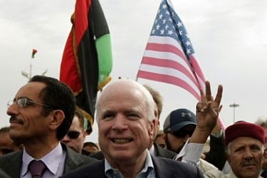 r_US Rebuplican senator John McCain (C) tours the Libyan rebel headquarters in their eastern stronghold city of Benghazi on April 22, 2011