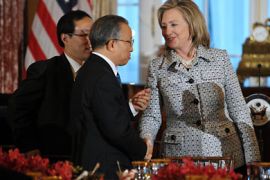 Secretary of State Hillary Clinton shakes hands with State Councilor Dai Bingguo at a dinner during the 2011 US-China Strategic and Economic Dialogue May 9, 2011 at the State Department in Washington, DC