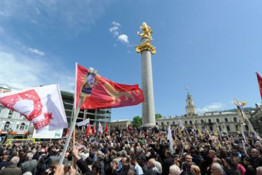 Georgian opposition activists demonstrate during a rally against President Saakashvili in the centre of Tbilisi on May 21, 2011. Several thousand opposition supporters rallied in the Georgian capital on Saturday calling for the resignation of President Mikheil Saakashvili, whom they accuse of authoritarianism.