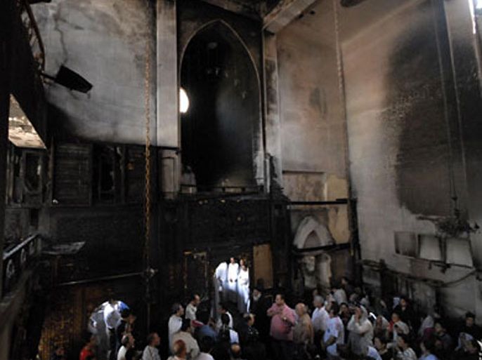 أسر مسيحية داخل كنيسة أمبابة المحترقة