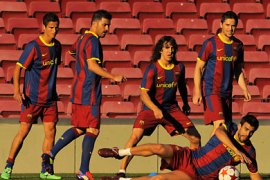 getty-BARCELONA, SPAIN - MAY 23: (L to R) Ibrahim Afellay, David Villa, Carles Puyol, Fontas