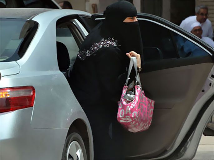A Saudi woman gets out of a car after being given a ride by her driver in Riyadh on May 26, 2011 as a campaign was launched on Facebook calling for men to beat Saudi women who drive their cars in a planned protest next month against the ultra-conservative kingdom's ban on women taking the wheel
