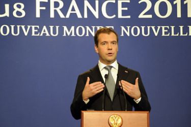 Russian President Dmitry Medvedev talks during a press conference at the end of the G8 summit in Deauville, on May 27, 2011