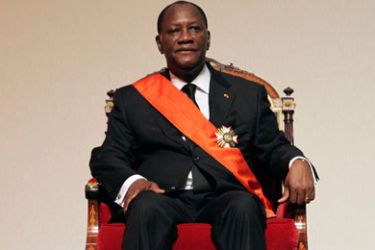 Ivory Coast President Alassane Ouattara looks on during his inauguration ceremony at the Felix Houphouet-Boigny Foundation in Yamoussoukro May 21, 2011. Ouattara was inaugurated as president of Ivory Coast on Saturday, in a ceremony most Ivorians hope will put a decade of conflict and instability behind them and mend a once prosperous economy.