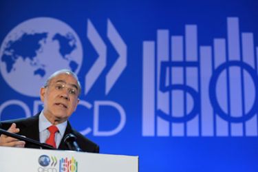 Secretary General Angel Gurria delivers a speech during the presentation of the 2011 global growth forecast at the OECD (Organisation for Economic Cooperation and Development) headquarters in Paris, on May 25, 2011 during the OECD 50th anniversary forum
