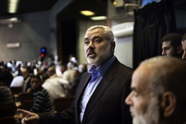 : Ismail Haniya, the head of the Hamas government in the Gaza Strip, arrives at the venue in Gaza City where he gave a public address on May 5, 2011,