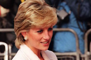 FILES- File picture dated 06 March 1996 showing Lady Diana arriving in a London hospital sdurrounded by photographers for a charity visit. Lady Diana died 31 August in Paris in a car crash.