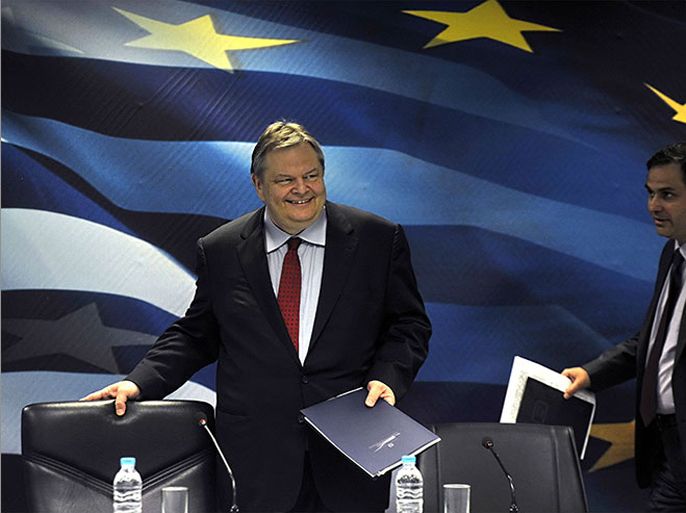 Greek Finance Minister Evangelos Venizelos arrives for a press conference following a first round of talks with top EU and International Monetary officials on crucial details of the latest austerity measures agreed to fight