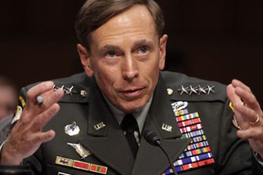 r_U.S. Army General David Petraeus gestures during the Senate Intelligence Committee hearing on his nomination to be director of the Central Intelligence Agency on Capitol Hill in Washington in this June 23, 2011 file photograph.