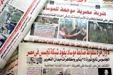 Egyptian broadsheet newspapers present on their June 13, 2011 front page pictures of Ilan Grapel, as Egypt's state security prosecution began questioning the Israeli man suspected of spying for the Mossad intelligence agency, state TV reported. Grapel was detained on June 12 from a Cairo hotel and ordered detained for 15 days pending investigation.