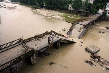 This photo taken on June 12, 2011 shows a collapsed bridge after a flood hit Tongcheng, central China's Hebei province. China's weather authorities warned Monday torrential rain that has triggered deadly