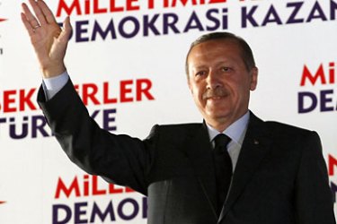 r_Turkey's Prime Minister Tayyip Erdogan greets his supporters at the AK Party headquarters in Ankara June 12, 2011. Erdogan's ruling AK Party was set to win Sunday's