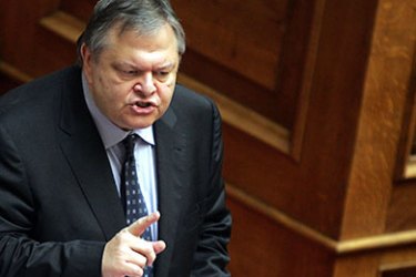 epa02802562 Greek Finance Minister Evangelos Venizelos speaks in Parliament, during the vote and debate on the implementation law that will accompany the Medium-Term Programme, in Athens, Greece, 30 June 2011. The Greek parliament voted for the new austerity plans needed to secure fresh international loans.