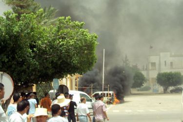 A car is set on fire on July 18, 2011 in Sidi Bouzid. A 14-year-old boy was killed on July 17 by a ricocheting bullet when police opened fire to break up a protest in Sidi Bouzid, the town where Tunisia's uprising erupted in December.