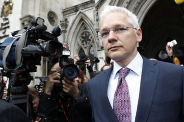 r_WikiLeaks founder Julian Assange leaves the High Court in London July 13, 2011. Two judges deferred a decision on Wednesday over whether to allow WikiLeaks' founder Julian Assange