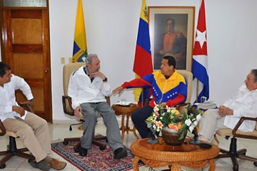 : In this picture released by Cuban website www.cubadebate.cu, Ecuadorian President Rafael Correa (L), former Cuban President Fidel Castro (2nd-L), Venezuelan President Hugo Chavez (2nd-R) and Cuban President Raul Castro talk during a meeting on July 21, 2011 in