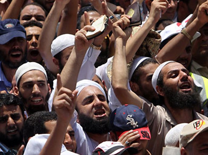 Salafi demonstrators attend a rally in downtown Cairo's Tahrir square on July 29, 2011. Tens of thousands packed Cairo's Tahrir Square, with Islamist groups dominating the protest meant to show unity during a fragile transition from ousted president Hosni Mubarak's regime.