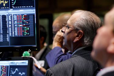 R_Traders work on the main trading floor of the New York Stock Exchange July 29, 2011. Stocks dropped for a fifth straight day on Friday after weak data on the economy and a setback