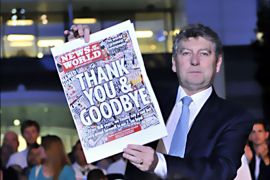 epa : epa02835784 (FILE) A file picture dated 09 July 2011 shows News of the World editor Colin Myler holding the last copy of the paper outside the main building of News International headquarters in London, Britain. Colin Myler and Tom Crone, the News of the World former legal manager,