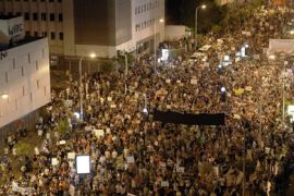 Tens of thousends of Israeli march in the center of Tel Aviv on August 6, 2011 in protest against the rising prices of real estate in Israel.