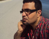 الروائي التونسي كمال الرياحي (الجزيرة نت)