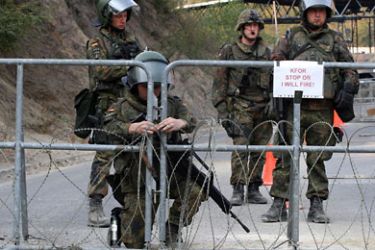 German KFOR soldiers guard the border Jarinje crossing with Serbia in the north of Kosovo on September 16, 2011