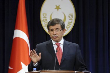 R-Turkey's Foreign Minister Ahmet Davutoglu speaks during a news conference in Ankara