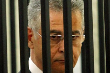 Former Lebanese General Fayez Karam, and high-profile member of a Christian party allied with Hezbollah, sits behind bars at a military court in the capital Beirut on charges of spying for Israel on September 3, 2011. Karam is charged with meeting Israeli officials outside of Lebanon and passing