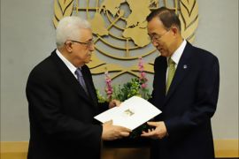 Palestinian Authority President Mahmoud Abbas hands over a formal letter for Palestine to be admitted as a state to the UN Secretary-General Ban Ki-Moon during the 66th UN General Assembly at the United Nations headquarters in New York, September 23, 2011.