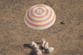 The Soyuz TMA-21 spacecraft is seen as it lands with Expedition 28 Commander Andrey Borisenko, and Flight Engineers Ron Garan, and Alexander Samokutyaev in a remote area outside of the town of Zhezkazgan, Kazakhstan, on Friday, Sept. 16, 2011.