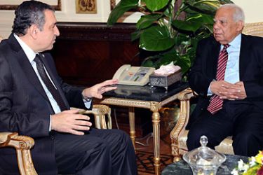 epa02828227 Prime Minister Essam Sharaf (L) gestures during his meeting with the new Minister of Finance Hazem Beblawi (R) in Cairo, Egypt, 17 July 2011. Egyptian Prime Minister Essam Sharaf appointed economist Hazem Beblawi as the new Minister of Finance on 17 July. Beblawi, a former undersecretary of the United Nations Economic and Social Commission for Western Asia, was also appointed as deputy prime minister for economic affairs. His appointment came shortly after
