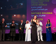المخرجة بوصبايا تتسلم جائزة أفضل مخرج من العالم العربي في مسابقة الأفلام الوثائقية (الجزيرة نت)