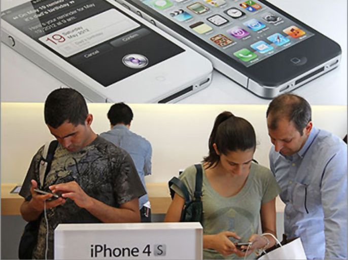 SAN FRANCISCO, CA - OCTOBER 14: Apple Store customers look at the new Apple iPhone 4Gs on October 14, 2011 in San Francisco, United States. The new iPhone 4Gs went on sale today and features a faster dual-core A5 chip, an 8MP camera that shoots 1080p HD video, and a voice assistant program. Justin Sullivan/Getty Images/AFP