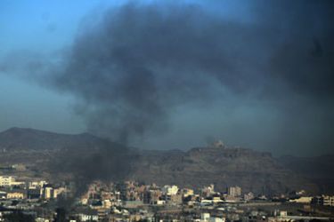 Black smoke rises from buildings following fierce assaults by Yemeni army forces loyal to Yemeni President Ali Abdullah Saleh against his opponents, in Sanaa, Yemen, 28 October 2011
