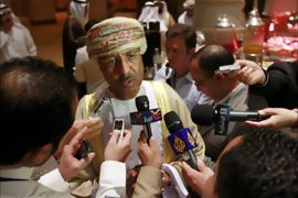 r_Oman's Finance Minister Darwish al-Balushi speaks to reporters during a meeting of Gulf Central Bank Governors and finance ministers in Abu Dhabi, October 22, 2011