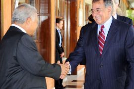 f_US Defense Secretary Leon Panetta (R) shakes hands with his Indonesian counterpart Purnomo Yusgiantoro (L) before their bilateral meeting during the Association of Southeast