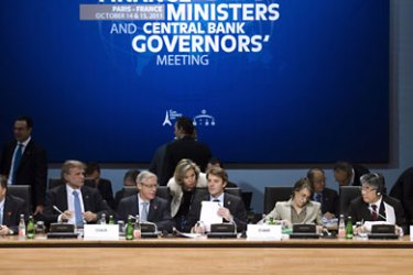 epa02967151 France Finance minister Francois Baroin (4-R) prepares to lead a meeting on the second day of the G20