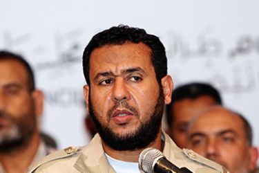 epa02949339 Abdel Hakim Belhaj, a Libyan commander of the anti-Gaddafi forces and head of the Tripoli Military Council, speaks during a press conference in Tripoli, Libya, 03 October 2011.