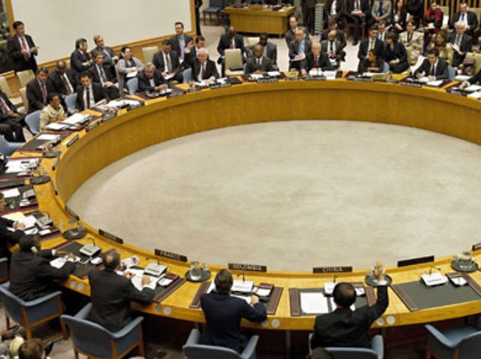 In this image released by the UN October 4, 2011 shows China and Russia use their veto votes to block an UN Security Council resolution calling for an immediate halt to the crackdown in Syria against opponents of the government of President Bashar al-Assad at the United Nations headquarters in New York, October 4, 2011.